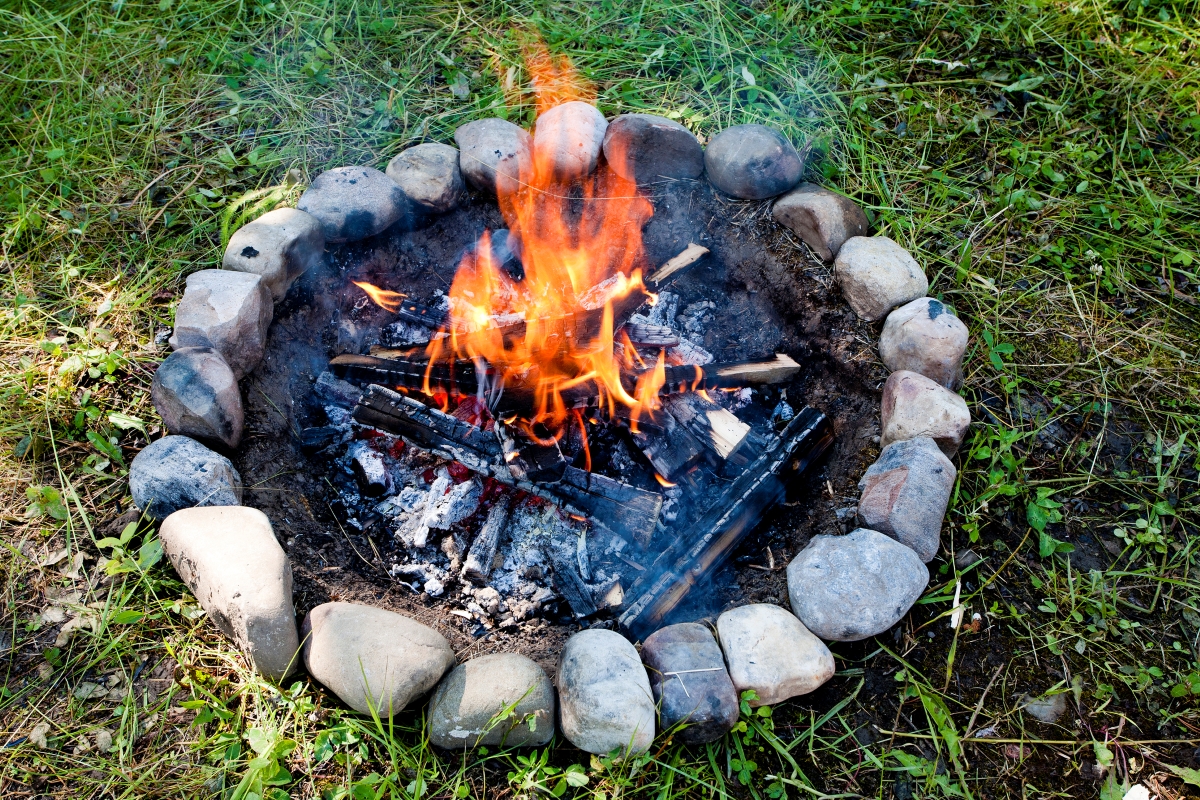 A small diy fire pit made with natural stone.