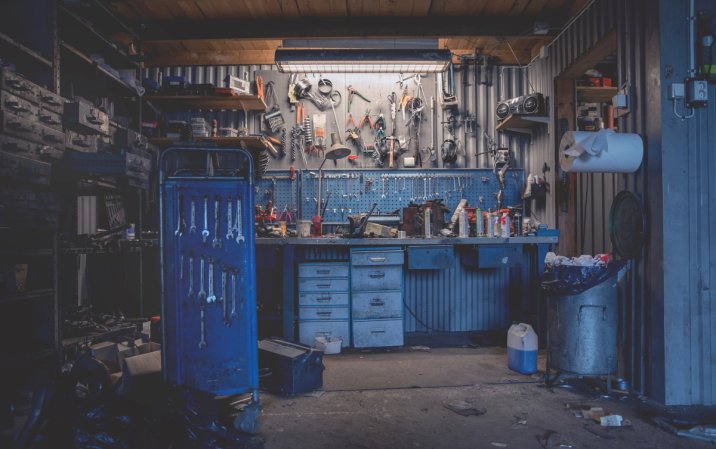 Home workshop at night with the lights on