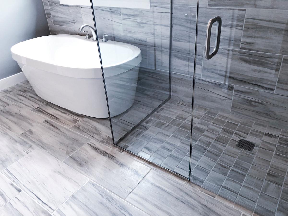 A view of the shower and tub in the bathroom.