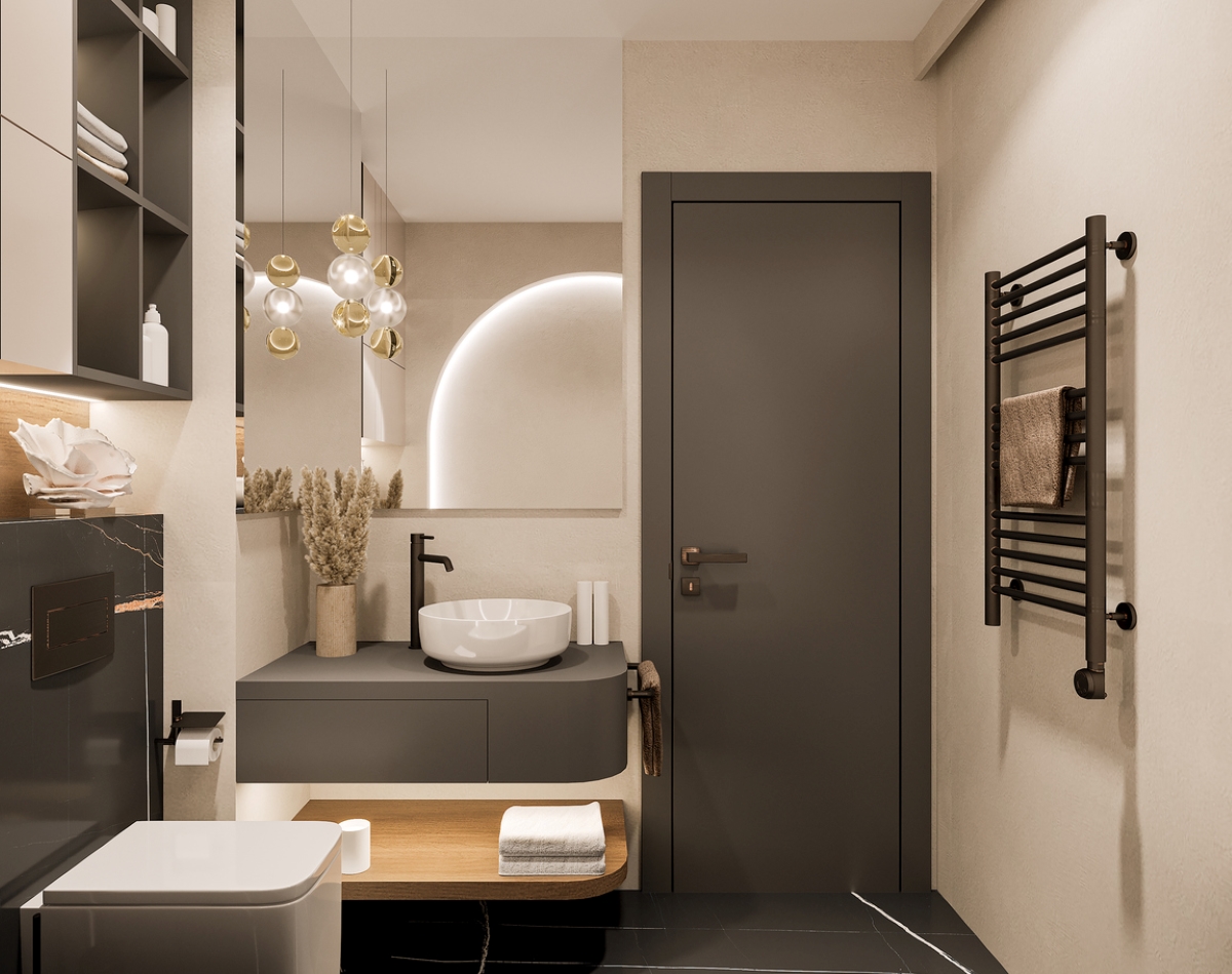 A small minimalist designed bathroom with a gray door and amenities. 