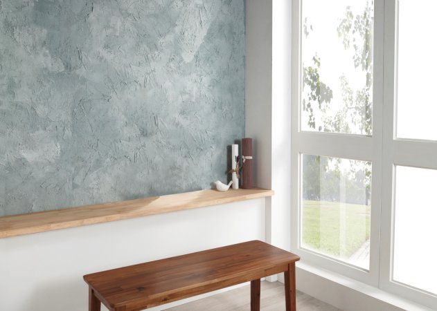 A room in the home with a signature textured gray wall.