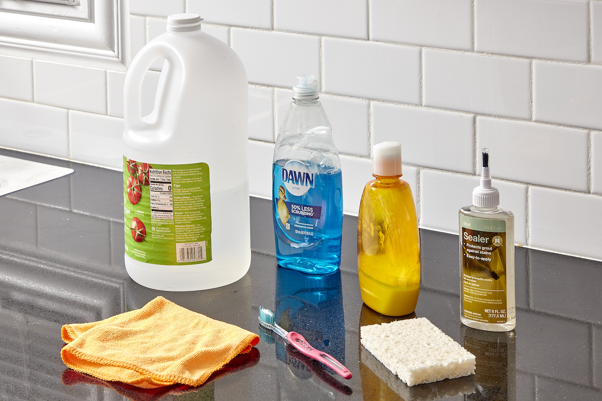 Materials needed for cleaning and sealing grout.