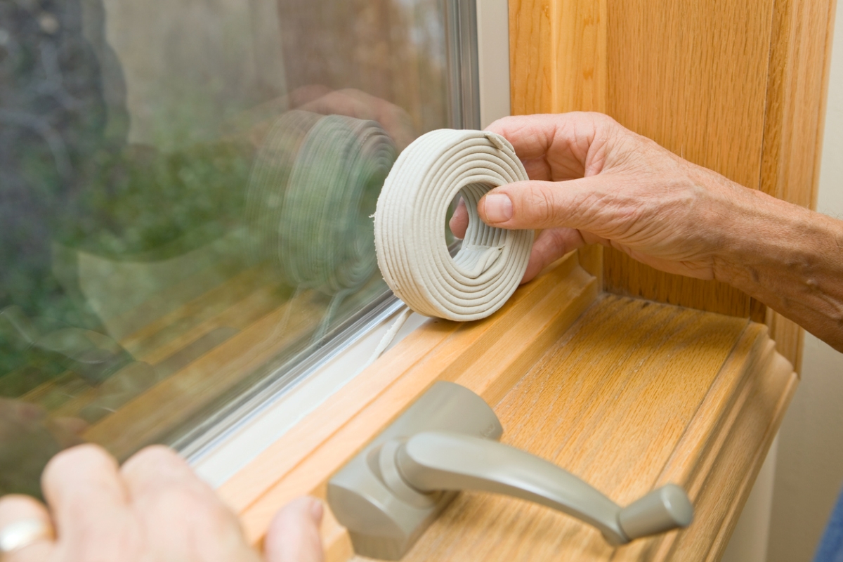 Weather stripping window sill.