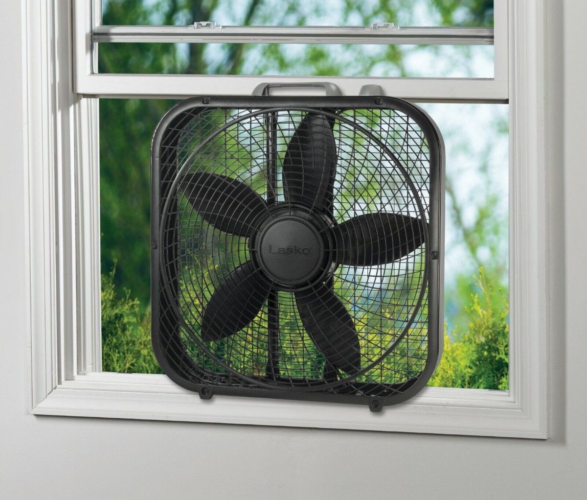 Black box fan in open window