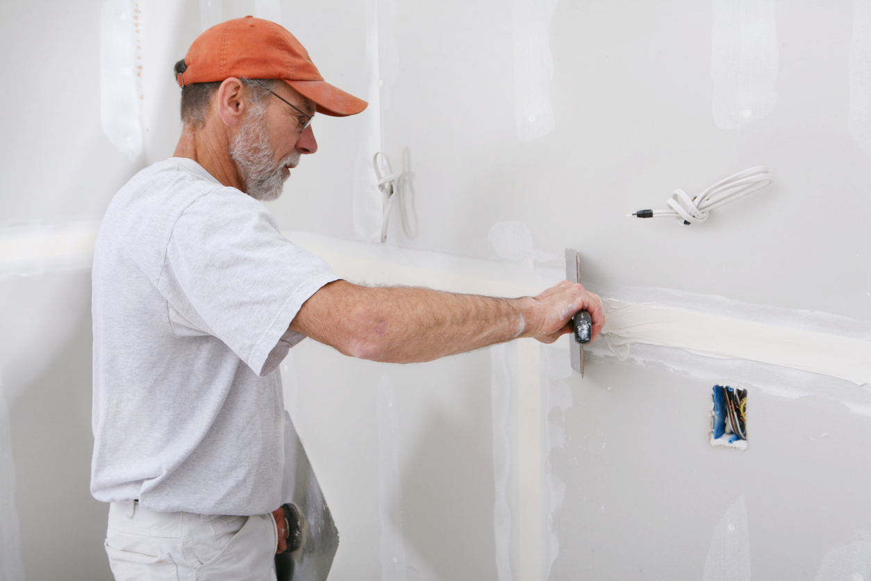 joint copound vs spackle man hanging drywall