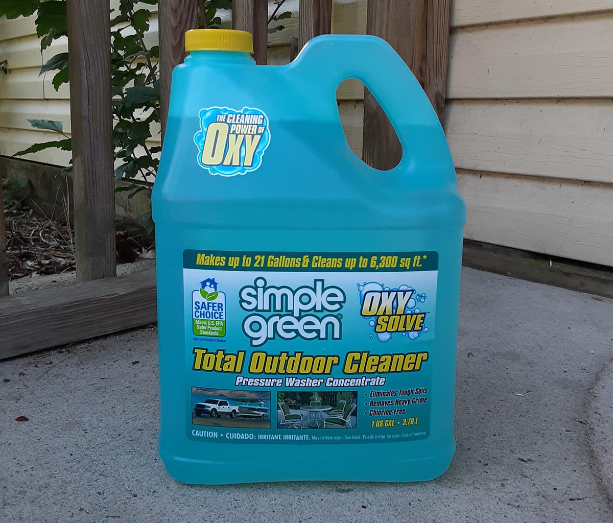 Bottle of Simple Green OxySolve total outdoor cleaner on concrete porch