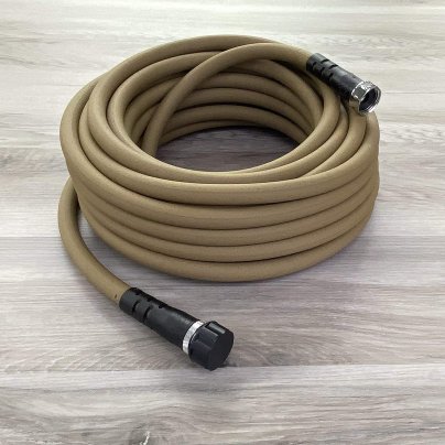 Water Right Soaker Garden Hose, 50-Foot on a wood floor