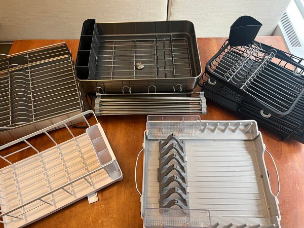 A group of the best dish-drying racks placed together on a kitchen counter.