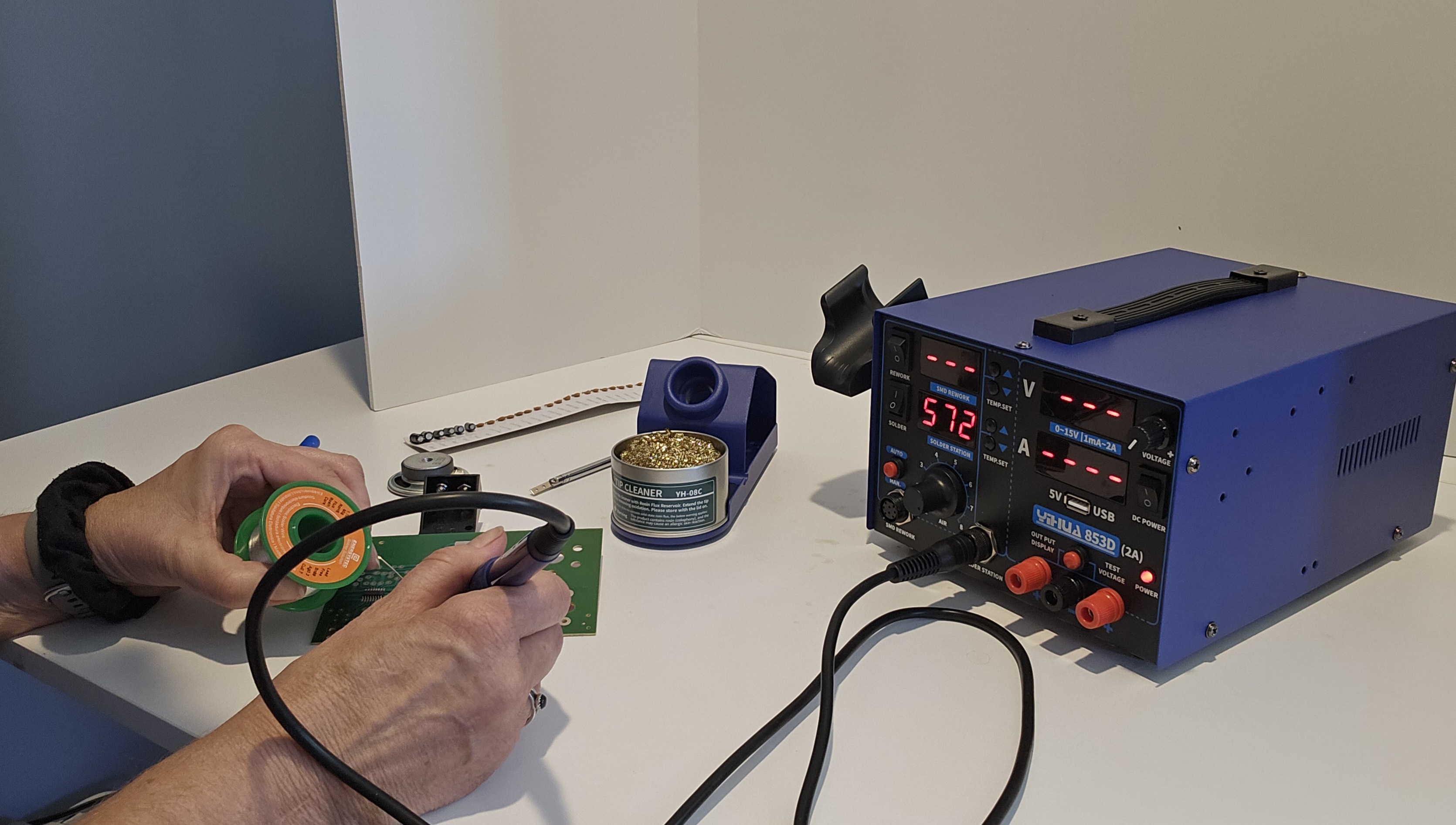 A man working with Yihua soldering station