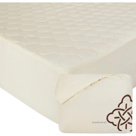  Bioweaves 100% Organic Cotton Mattress Pad Cover on a cream mattress on a white background