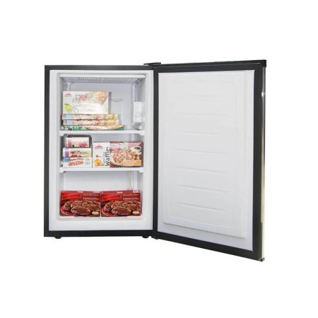  The Magic Chef 3.0 cu. ft. Compact Upright Freezer with its door open to show it full of frozen packaged food.