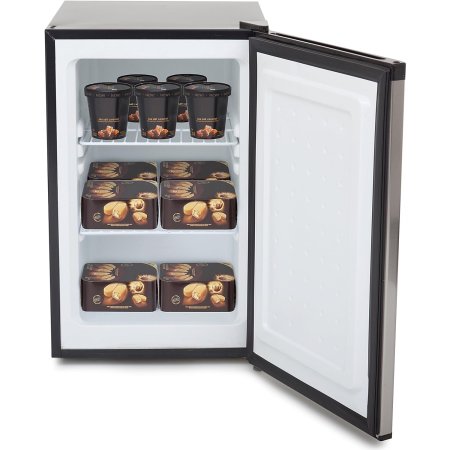  The Whynter 2.1 cu. ft. Energy Star Mini Upright Freezer with its door open to show it full of packaged food.