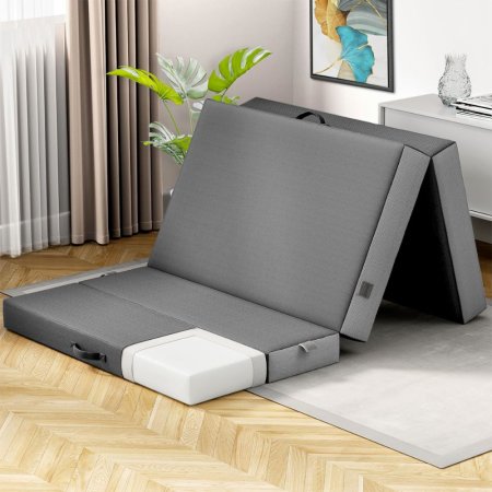  Cozzzi 4-Inch Folding Mattress With Removable Cover on a wood floor