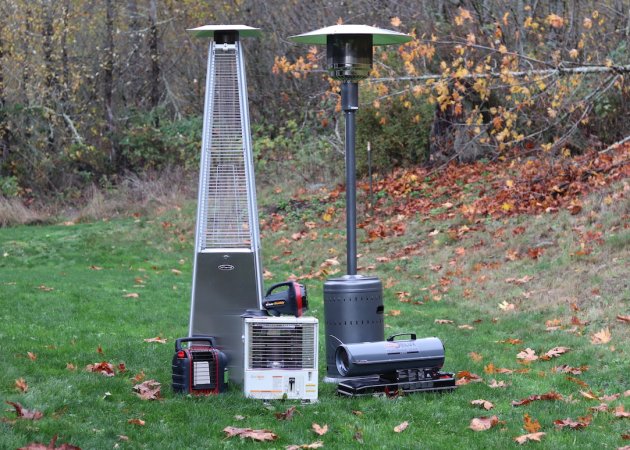 Six Non Electric Heaters on grass near woods