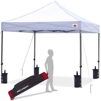 An ABCCanopy S1 Commercial Pop-Up Canopy with the silhouette of a person holding the carry case