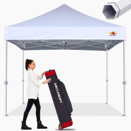  ABCCanopy 10x10 S2 Premium Pop-Up Canopy and a woman holding the carry case