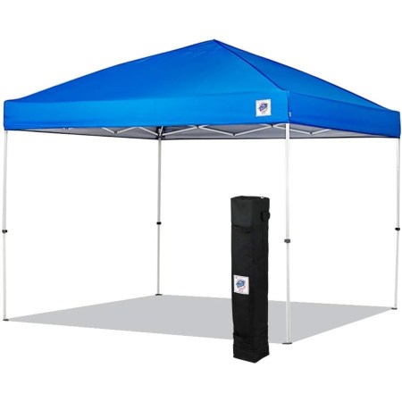  E-Z Up Envoy Canopy Shelter and its carry case on a white background