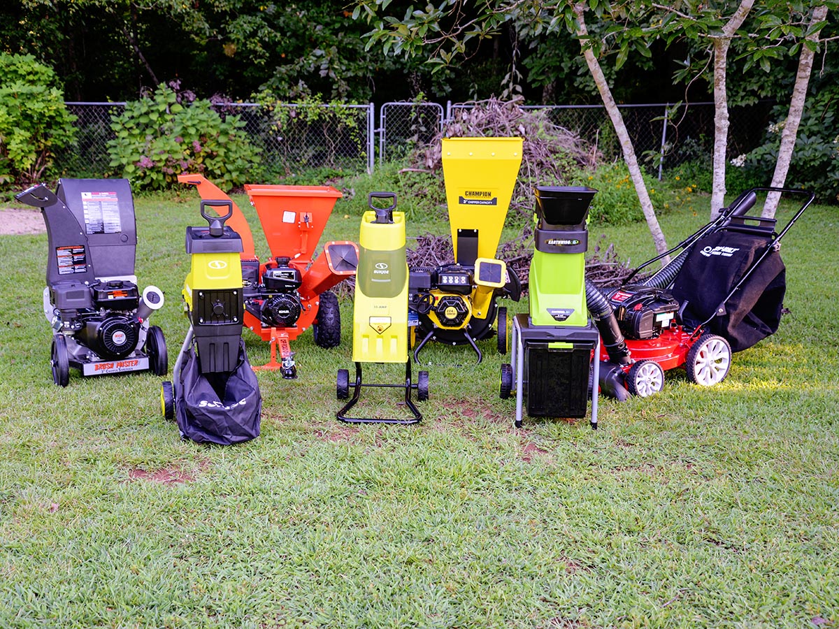 A group of the best wood chippers together in a yard.