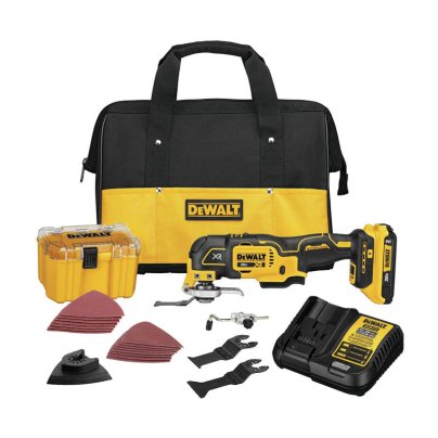 DeWalt 20V MAX XR Cordless Oscillating Multi-Tool Kit with all pieces laid out on a white background