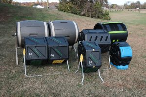 A group of the best compost tumblers together in a yard