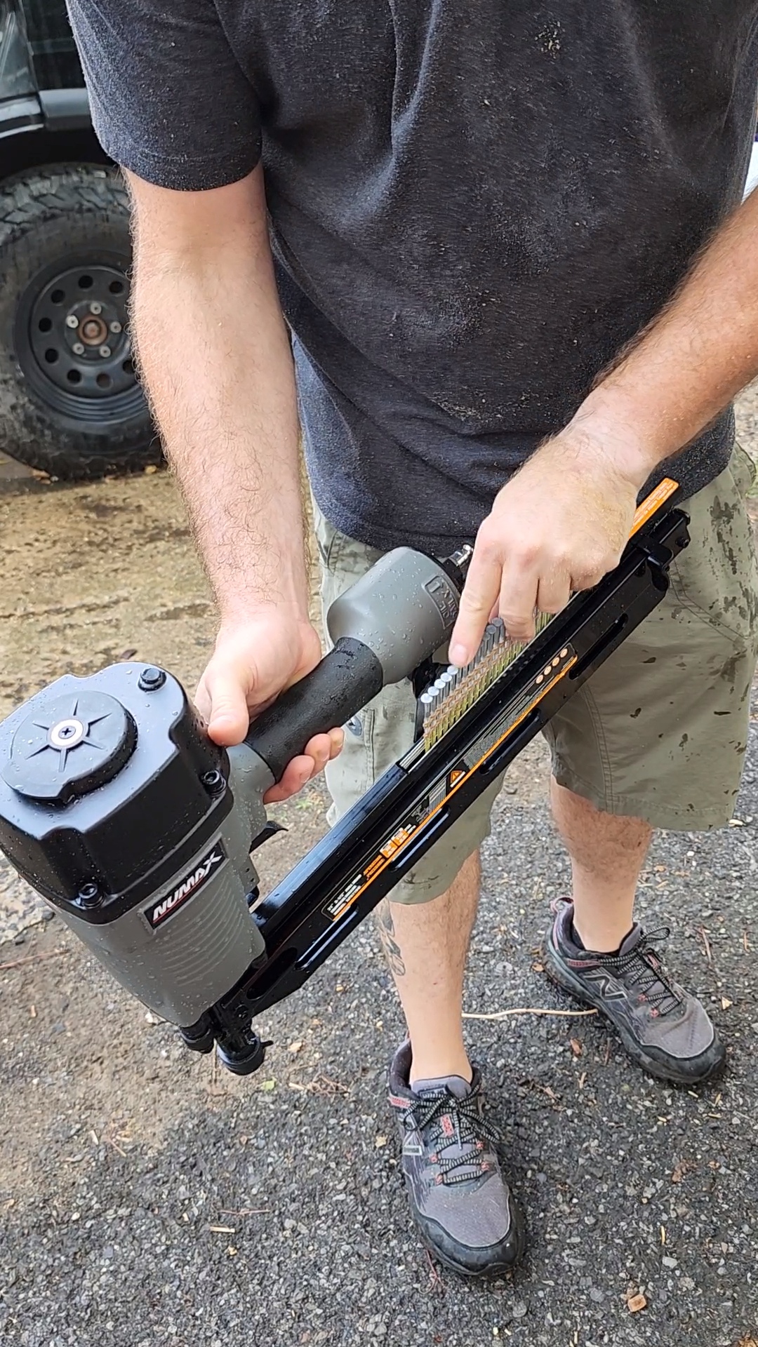 Tester loading a framing nailer