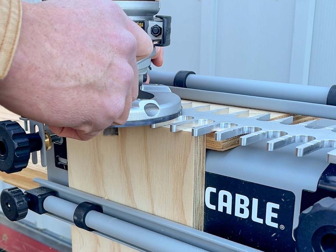 man working with Porter Cable dovetail jig