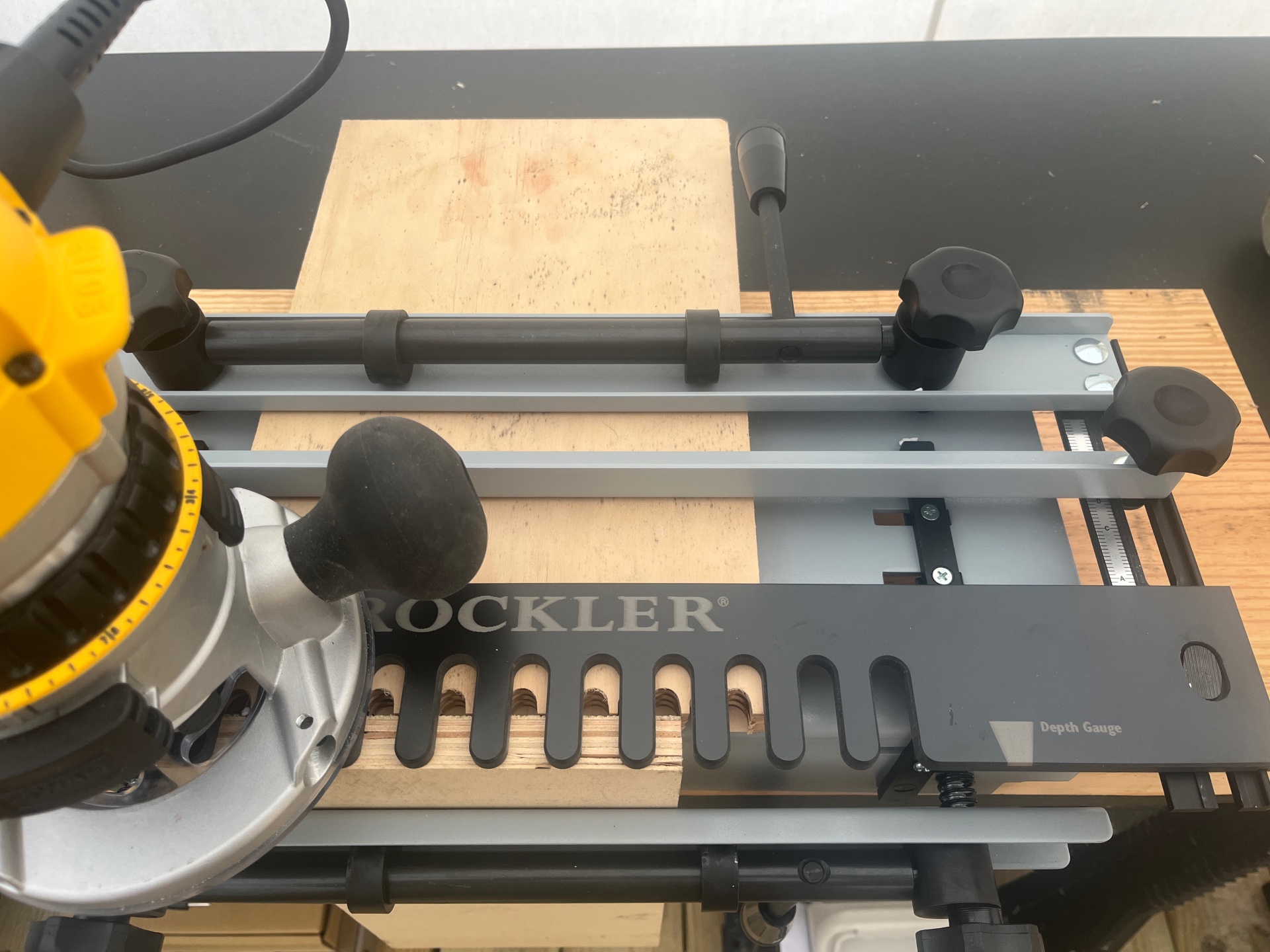 man working with Rockler dovetail jig