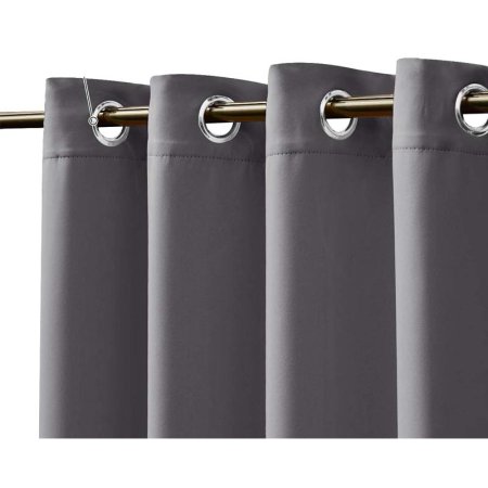  Metal grommets on Nicetown Triple-Weave Outdoor Blackout Curtains spaced out evenly on a metal curtain rod.