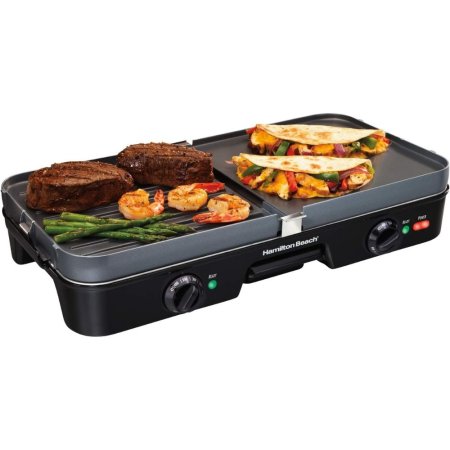  The Hamilton Beach 3-in-1 Grill/Griddle cooking various meats, vegetables, and prepared foods.