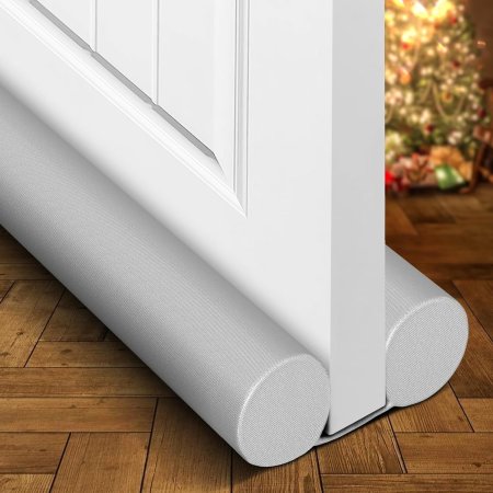  Holikme Twin Door Draft Stopper on the bottom of white door on wood floor