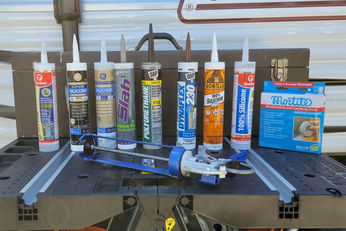 The 9 best exterior caulk options together on an outdoor workbench.