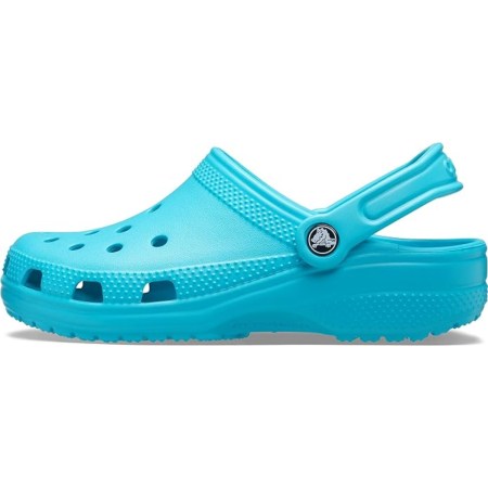  A turquoise pair of Crocs Classic Clogs on a white background.