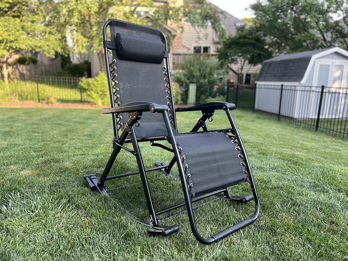Black rocking zero gravity chair on grass