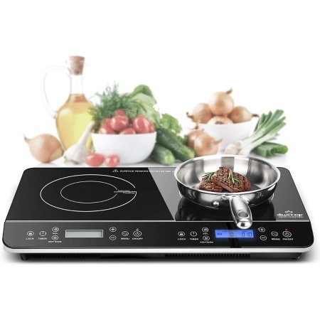  The Duxtop LCD Portable Double Induction Cooktop with a pan on it to cook beef and several vegetables and oils in the background.