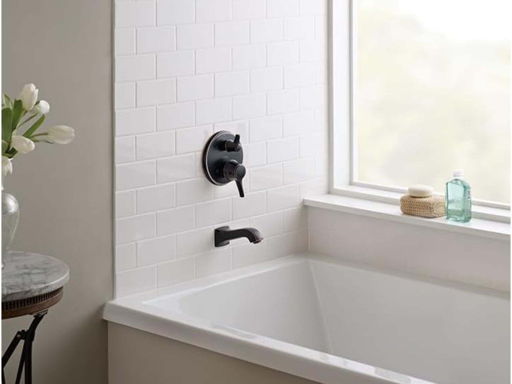 shower valves in a white bathroom 