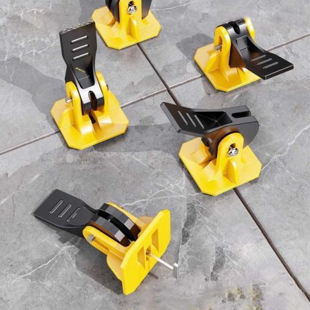  Facite Tile Leveling System sitting on grey tiles