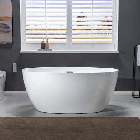  Woodbridge 55-Inch Acrylic Freestanding Bathtub in front of a window