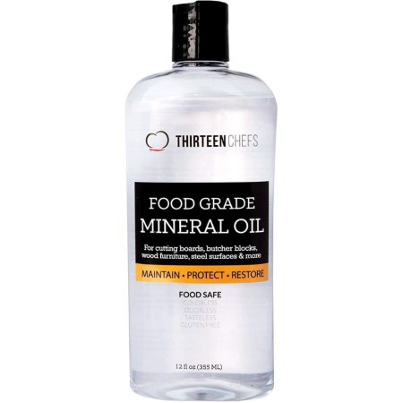  A bottle of Thirteen Chefs Food Grade Mineral Oil on a white background.