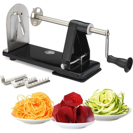  The ICO 4-Blade Vegetable Spiralizer and three bowls of spiraled vegetables in bowls on a white background.