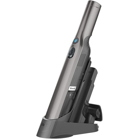  The Shark WANDVAC Cordless Handheld Vacuum in its charging stand on a white background.