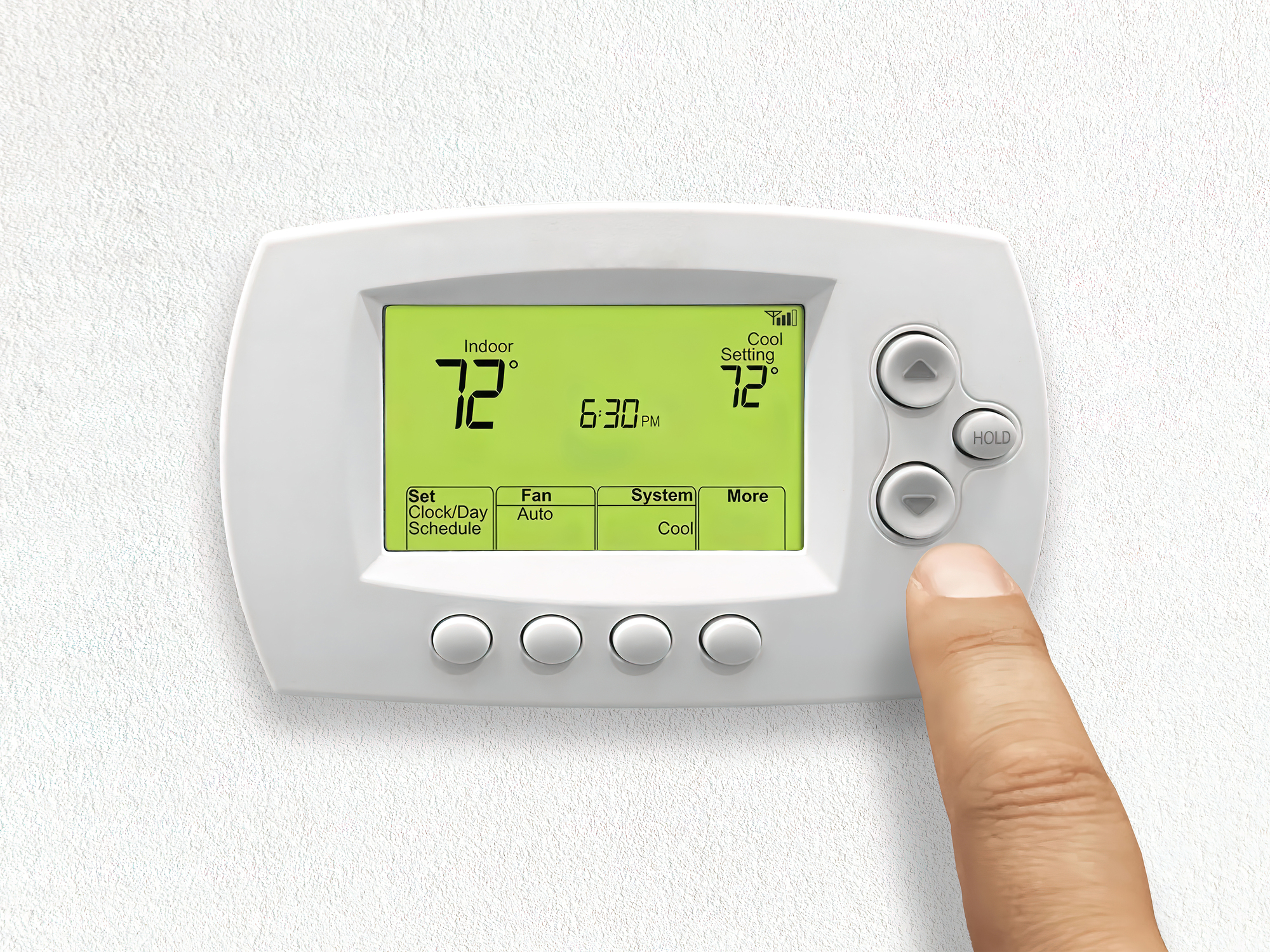 a hand setting one of the Best Non Programmable Thermostat 