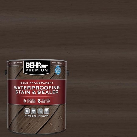  A can of Behr Premium Waterproofing Stain & Sealer on a dark background.