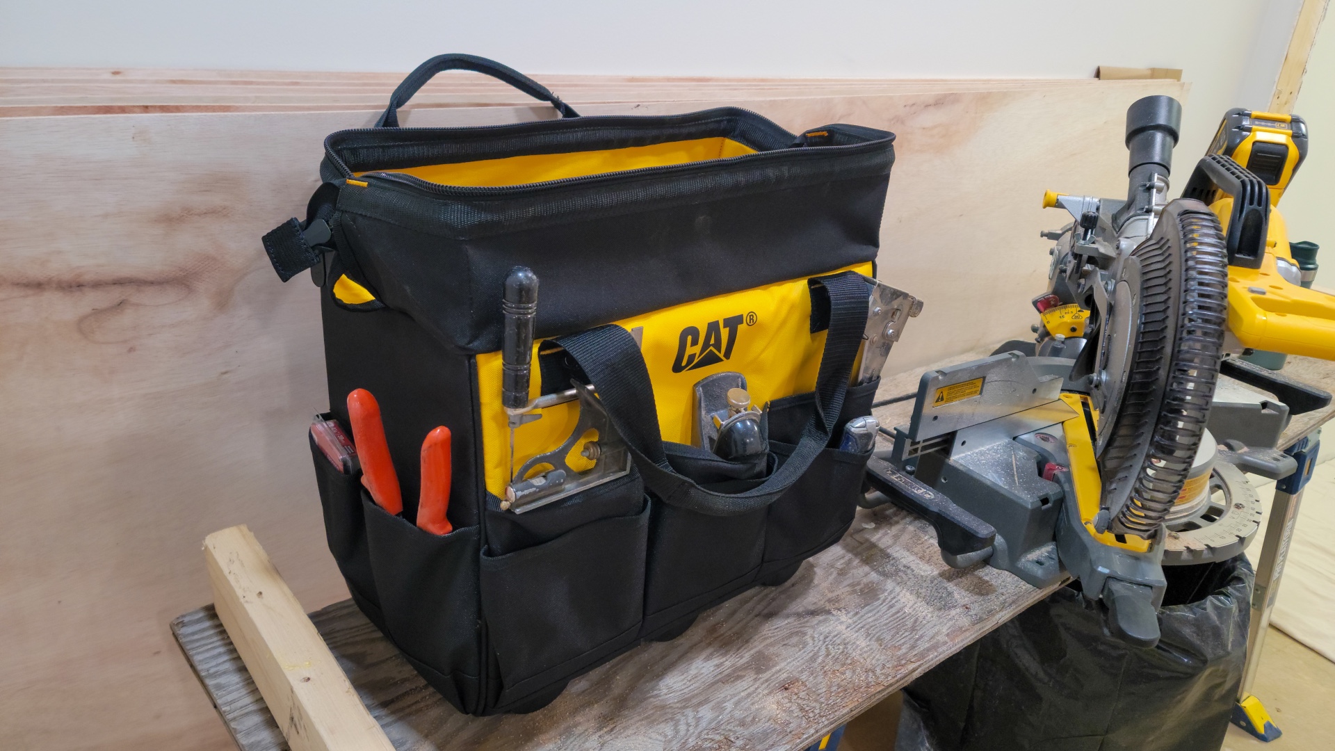 CAT rolling tool bag close-up set on a table n a workshop