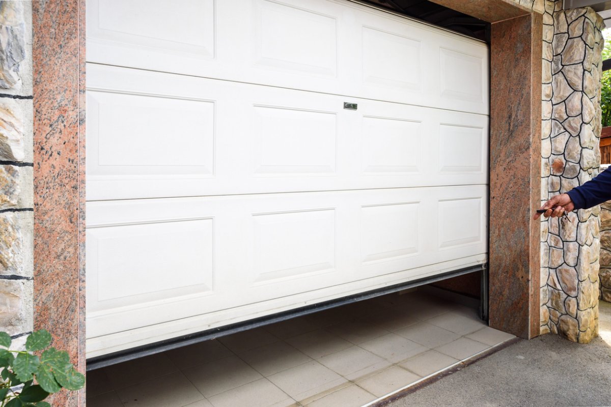 Hand use remote controller for closing and opening garage door