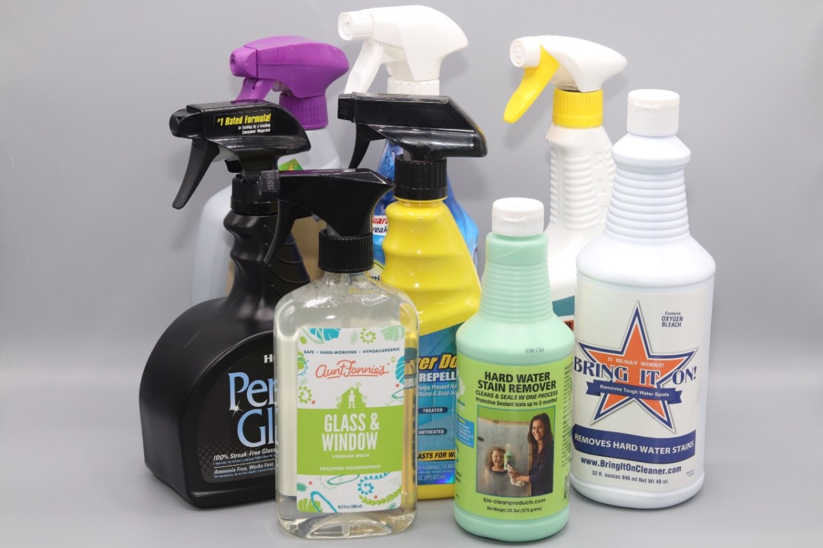 A group of the Best Cleaner For Glass Shower Doors on a counter before testing.