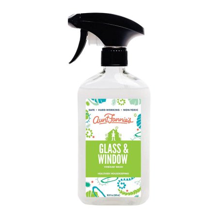  A spray bottle of Aunt Fannie’s Glass & Window Vinegar Cleaner on a white background.