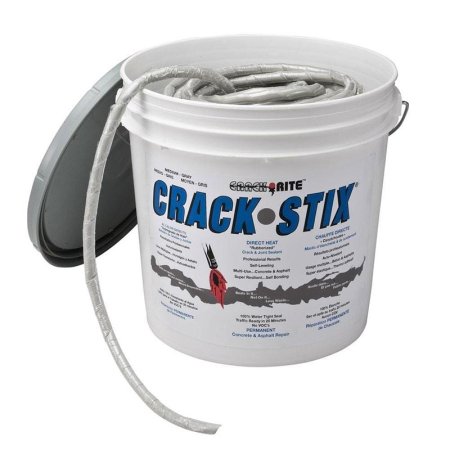  A tub of the Crack Stix Permanent Concrete Joint & Crack Filler with its lid off and a part of the product coming out the top.