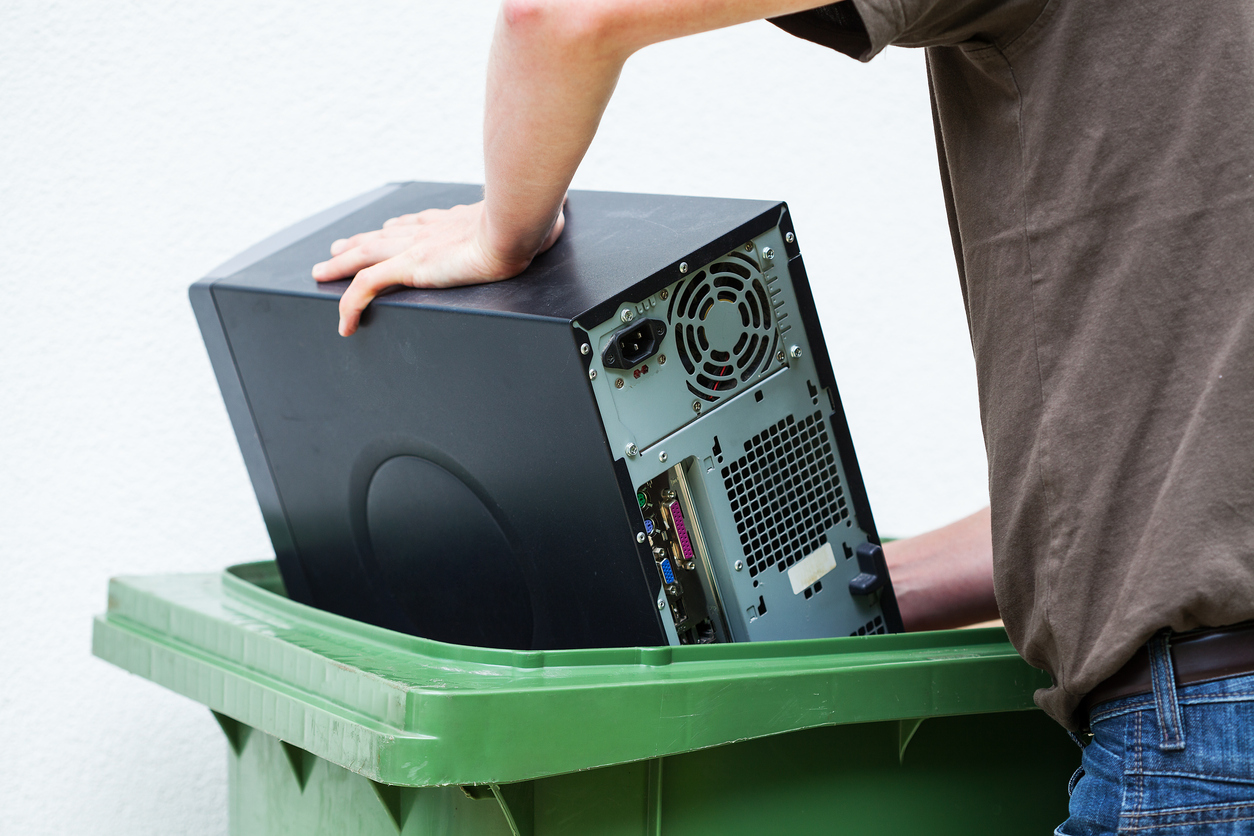 Men throwaway hardware into container