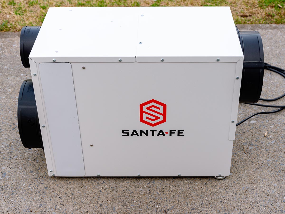A Santa Fe dehumidifier outside on the pavement