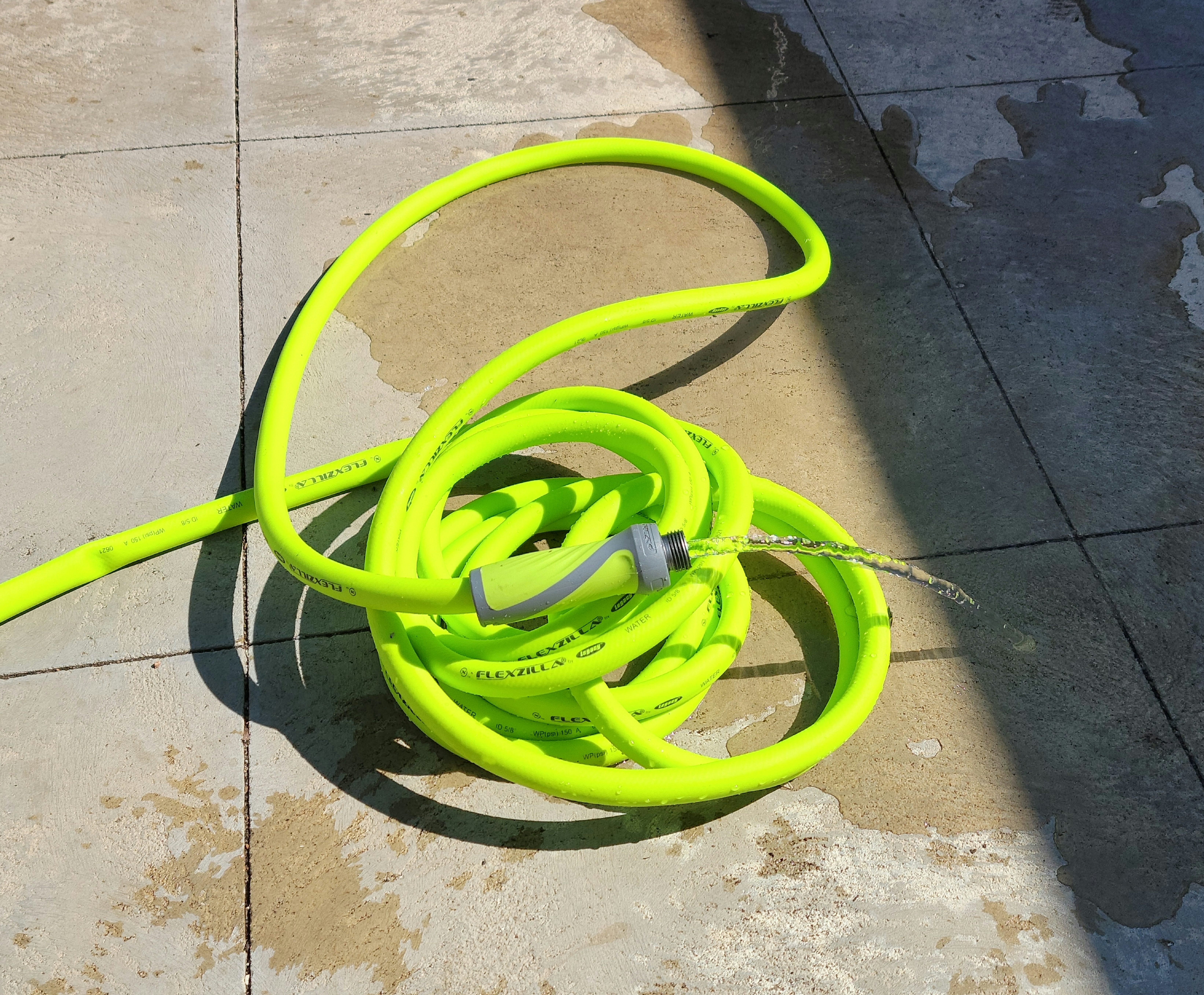 Garden hose being used and tested for kinks